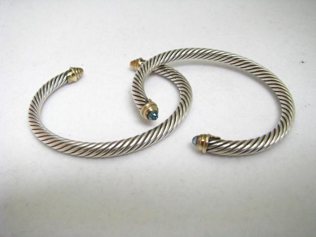 Appraisal: Two Yurman Bangles K yellow gold and silver including one