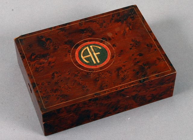 Appraisal: Burl veneer cigar box with inlaid allied forces insignia on