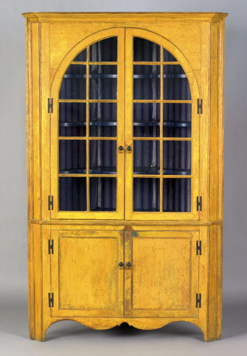 Appraisal: Pennsylvania painted pine one-piece corner cupboard ca the molded cornice