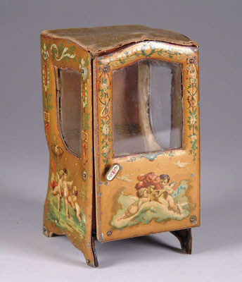 Appraisal: TIN LITHO AND VELVET SEDAN CHAIR Great small enclosed chair