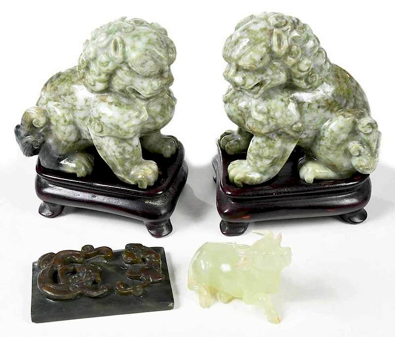 Appraisal: Three Carved Chinese Decorative Table Objects dark green carved rectangular