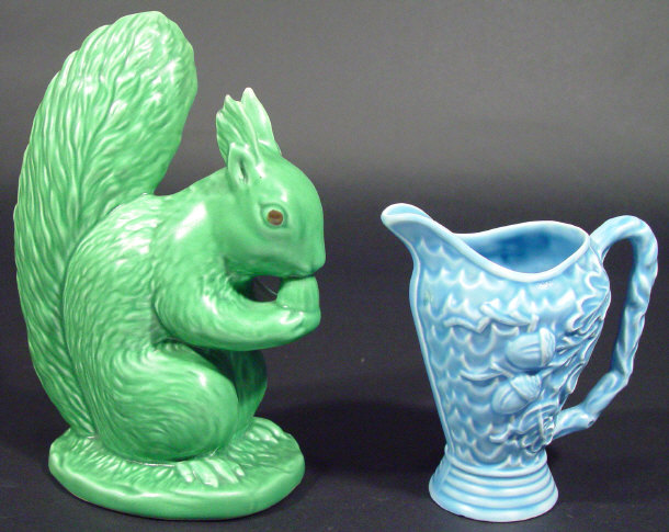 Appraisal: Sylvac green glazed squirrel and a blue glazed Wade jug