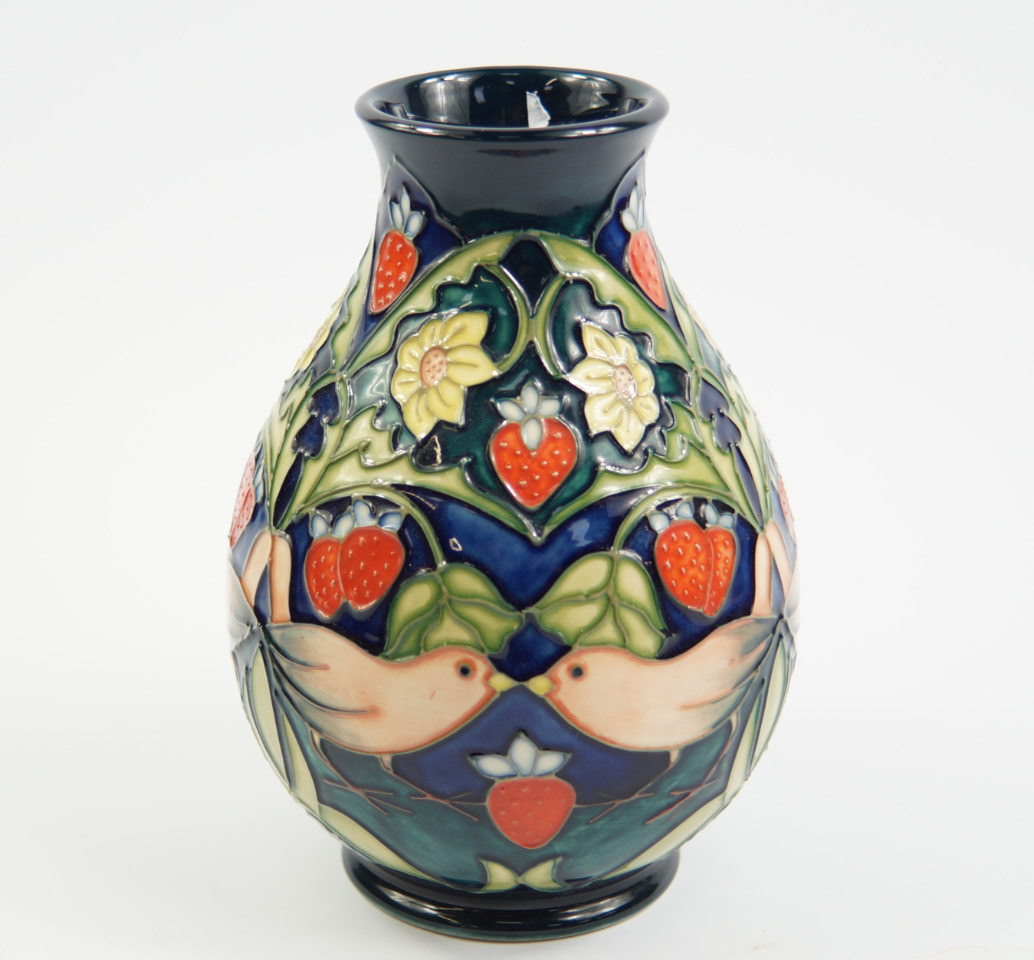 Appraisal: A Moorcroft Pottery vase decorated in The Strawberry Thief pattern