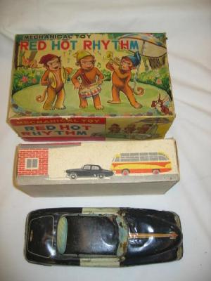 Appraisal: A Japanese Red Hot Rhythmn monkey band toy tin plate