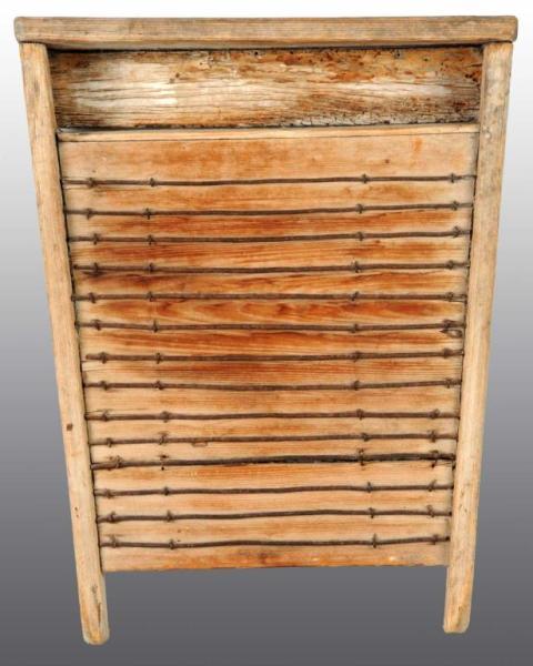 Appraisal: Wooden Washboard Description Wooden board with wired surface Condition Very