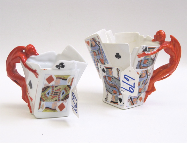 Appraisal: TWO ROYAL BAYREUTH DEVIL PLAYING CARD PITCHERS Heights and Condition