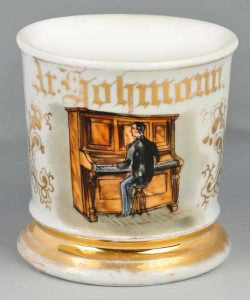 Appraisal: Piano Player Shaving Mug Description Gilt name Ar Dohmann Shows