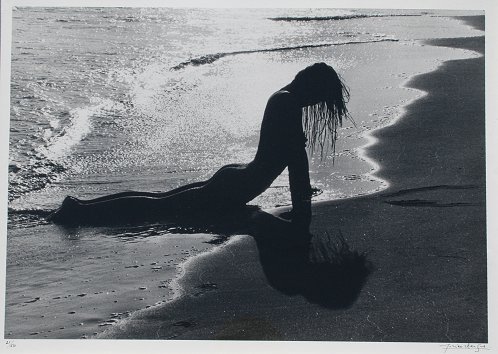 Appraisal: CLERGUE Lucien French - Female Nude Silhouette on the beach