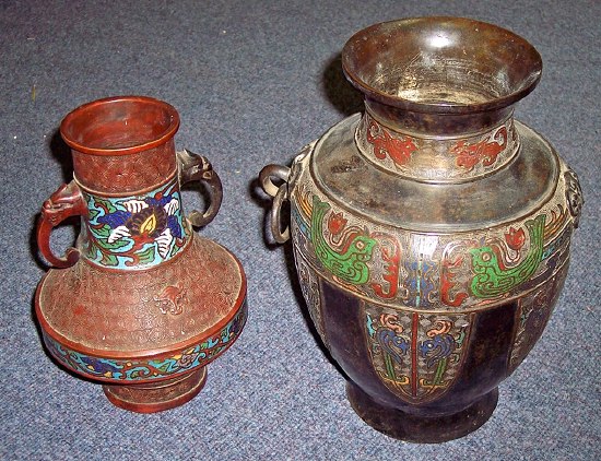 Appraisal: A Chinese bronze and cloisonne vase with ring handles having