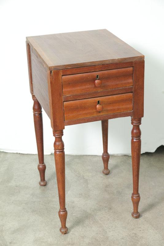 Appraisal: TWO DRAWER STAND Walnut with rolled drawers wooden pulls turned