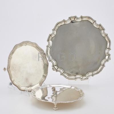 Appraisal: THREE ENGLISH SILVER FOOTED SALVERS Large salver Chippendale piecrust edge