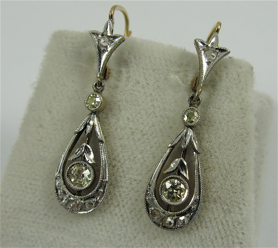 Appraisal: PAIR OF DIAMOND AND K GOLD EARRINGS each white and