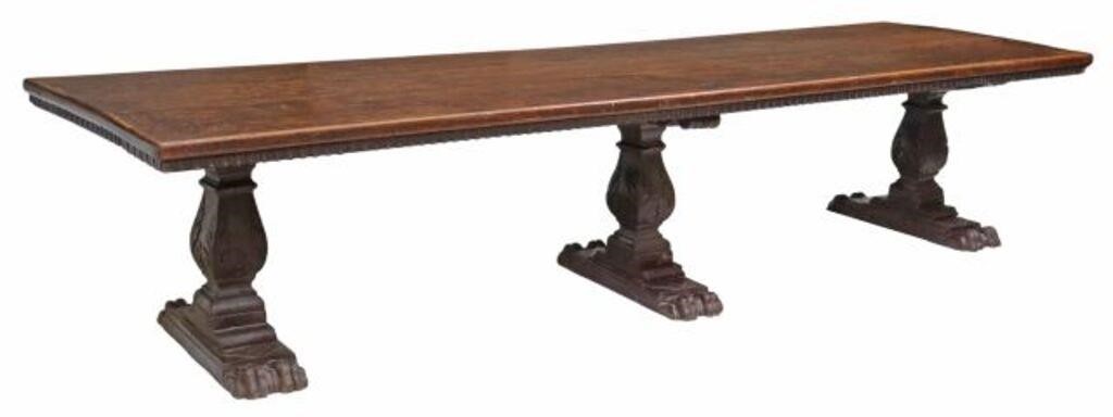 Appraisal: Monumental Italian walnut table th c having three-plank top with