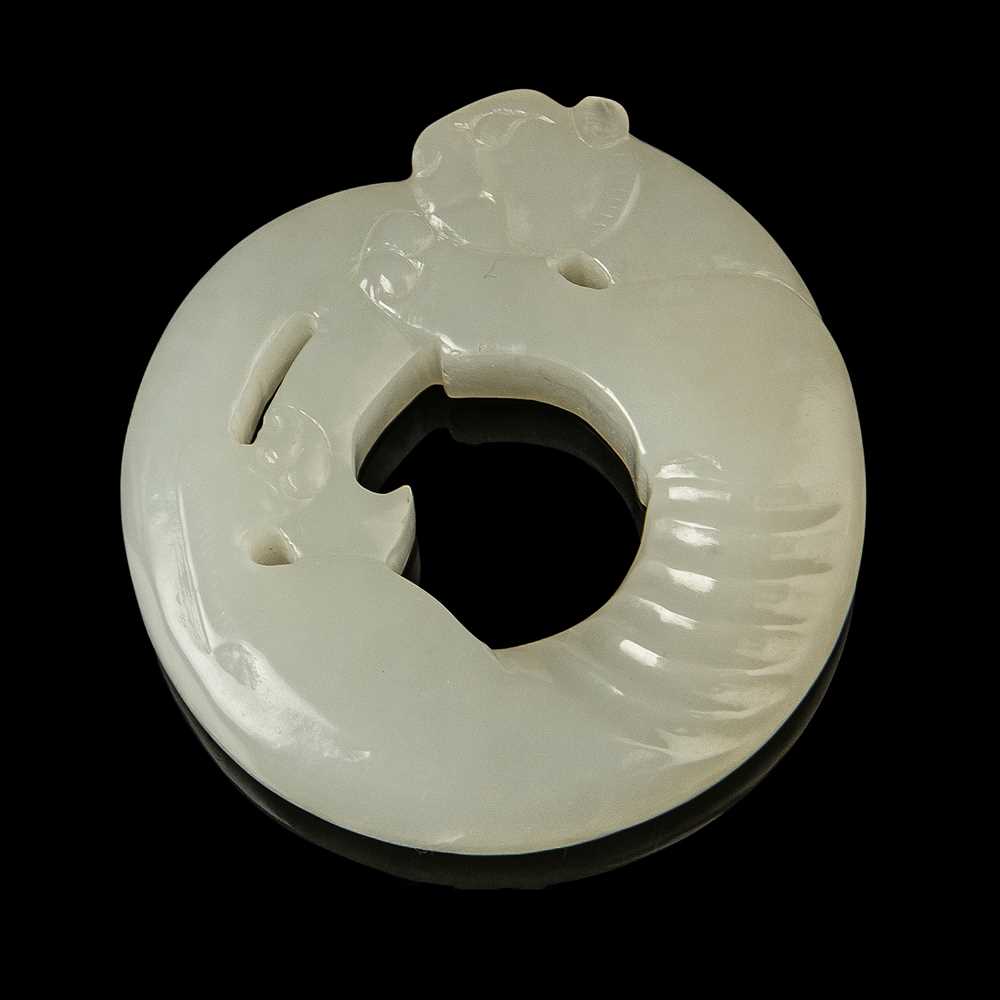 Appraisal: WHITE JADE CARVING OF A TIGER PENDANT QING DYNASTY TH-