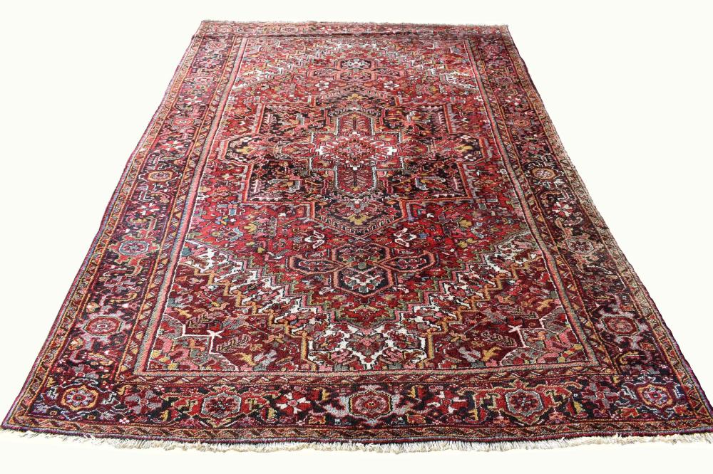 Appraisal: HERIZ CARPETMid th Century The center medallion on a field