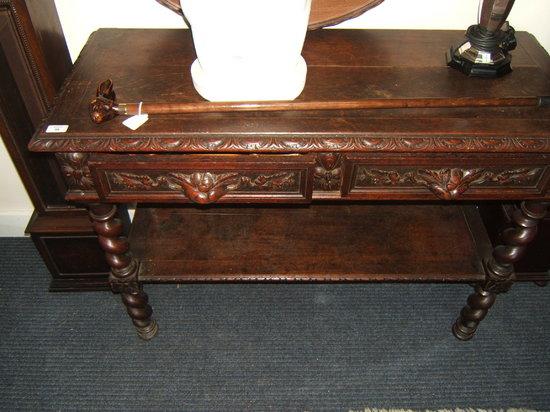 Appraisal: A th Century Continental oak sideboard with carved decoration and