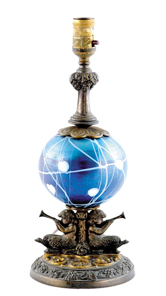 Appraisal: Art glass and bronze table lamp early th century iridescent