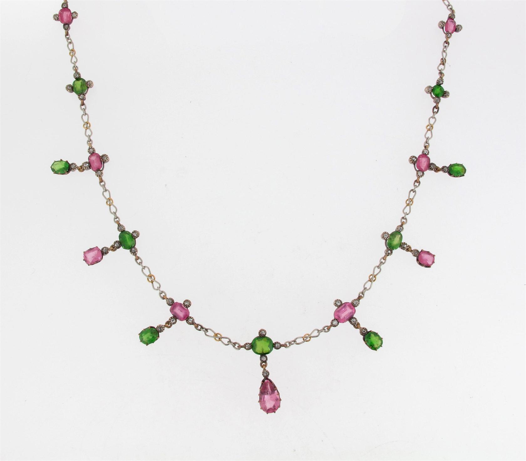 Appraisal: An Edwardian necklace alternately set with oval shaped pink topaz