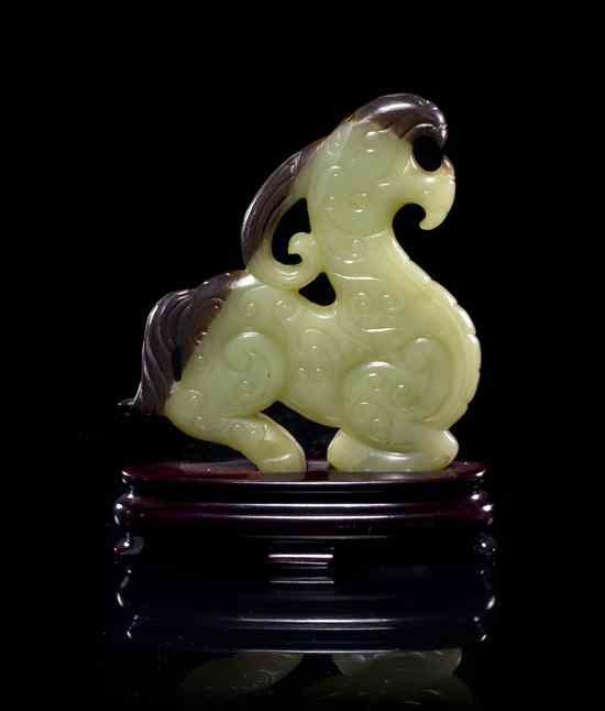 Appraisal: A Jade Carving of a Beast of green and russet