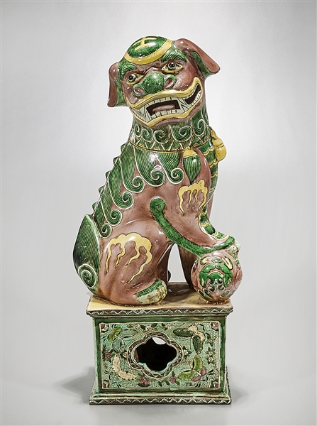 Appraisal: Chinese glazed porcelain fio lion with right raised paw base