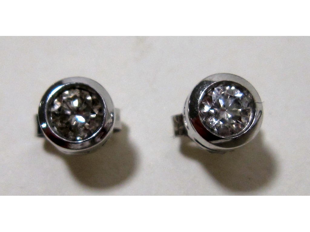 Appraisal: Pair of ct white gold mounted diamond stud earrings with