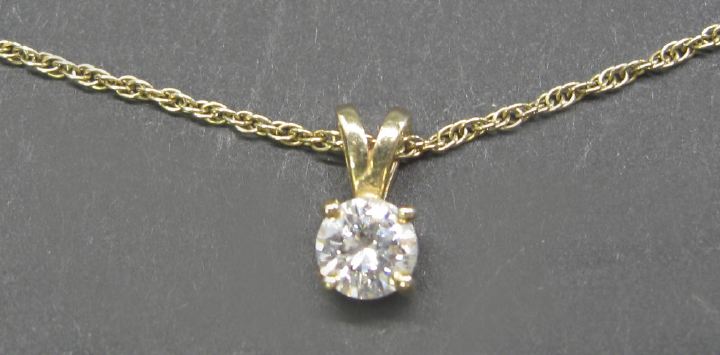 Appraisal: Fourteen-Karat Yellow Gold and Diamond Pendant Drop the fine yellow