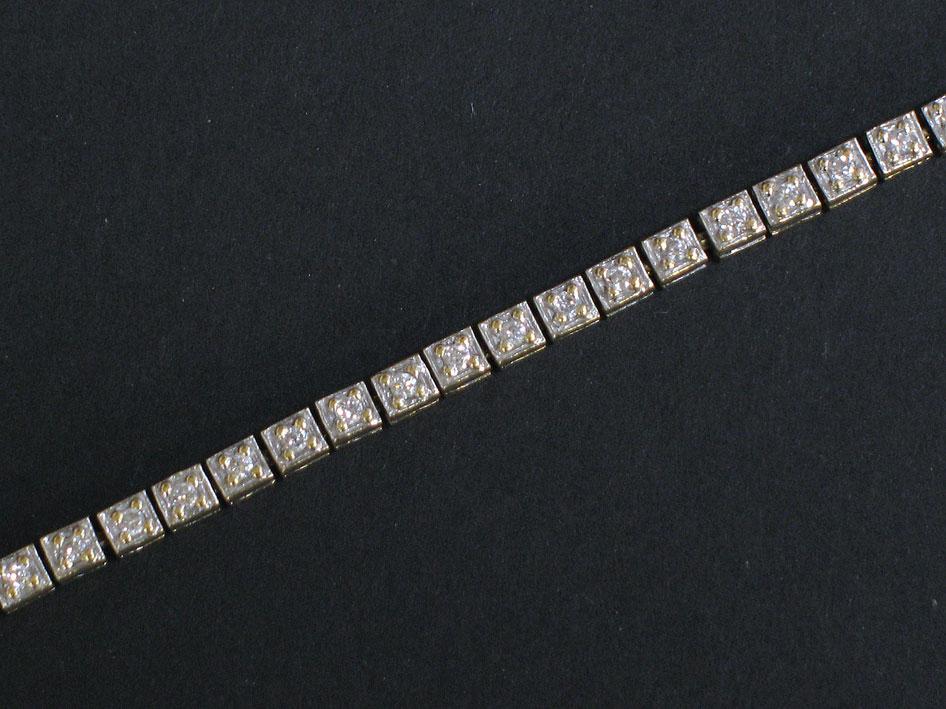 Appraisal: A MODERN DIAMOND BRACELET each square link illusion-set with a