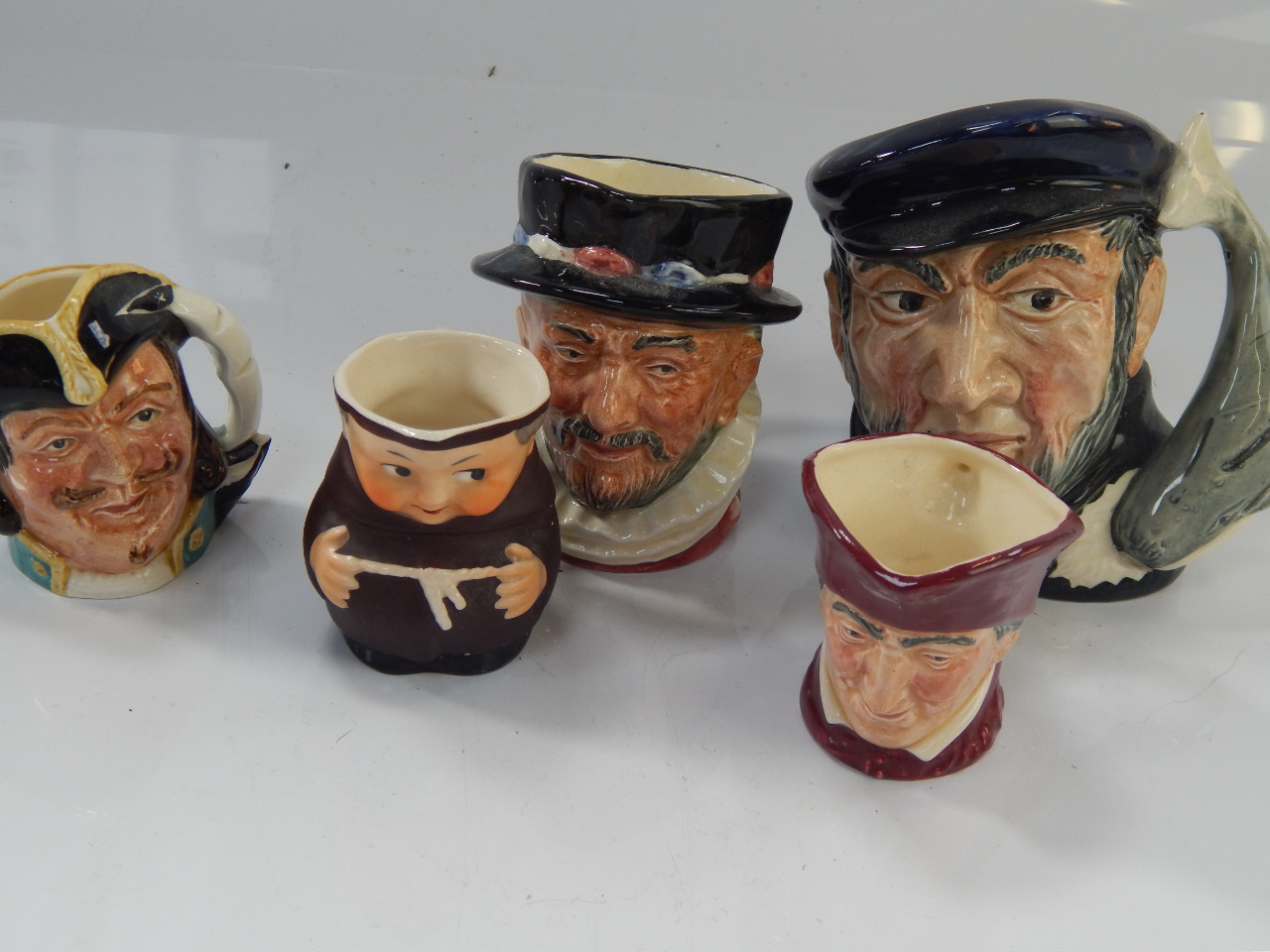 Appraisal: Royal Doulton character jugs including Captain Ahab Captain Henry Morgan