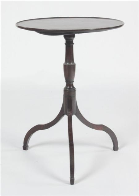 Appraisal: A Regency mahogany circular occasional tilt-top table the dished top