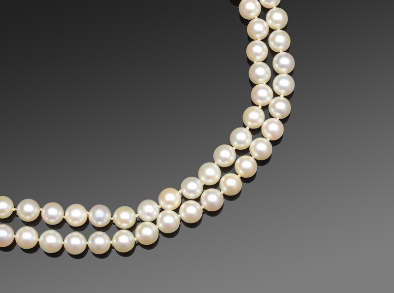 Appraisal: DOUBLE STRAND OPERA LENGTH AKOYA PEARL NECKLACE '' strand of