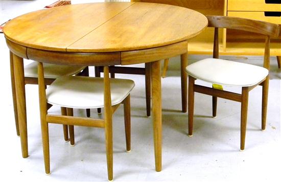 Appraisal: Frem Rojle table with four chairs designed by Hans Olsen