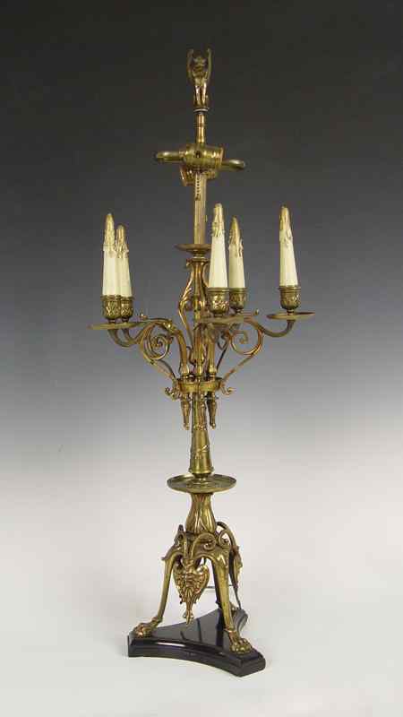 Appraisal: BRONZE TABLE TOP CANDELABRA LAMP Tri legged paw foot base