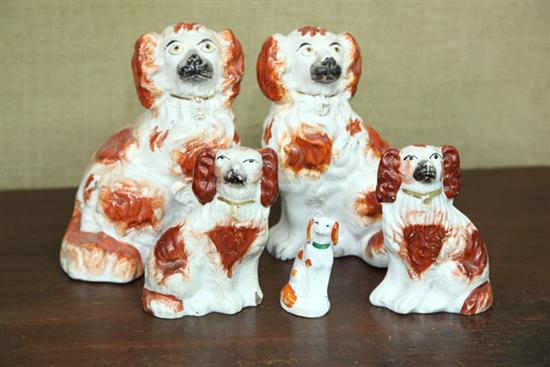 Appraisal: TWO PAIR OF STAFFORDSHIRE DOGS Seated dogs with gilt collars