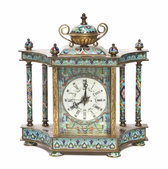 Appraisal: A Champleve Decorated Mantel Clock having an urn form finial