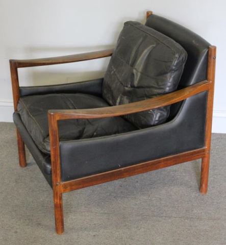 Appraisal: Midcentury Rosewood and Leather Lounge Chair Unmarked Closed back leather