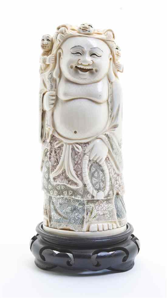 Appraisal: A Chinese Tinted Ivory Figure of a Hotei depicted holding