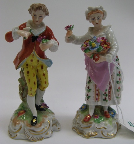 Appraisal: PAIR OF DRESDEN PORCELAIN FIGURES of a man and a