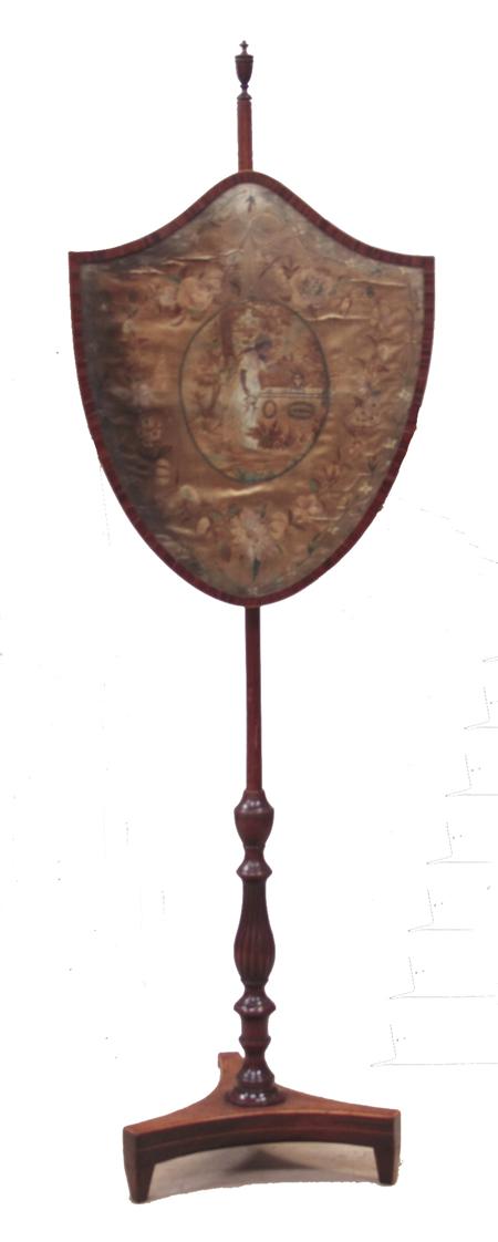 Appraisal: A George III mahogany pole screen the arched shield shape