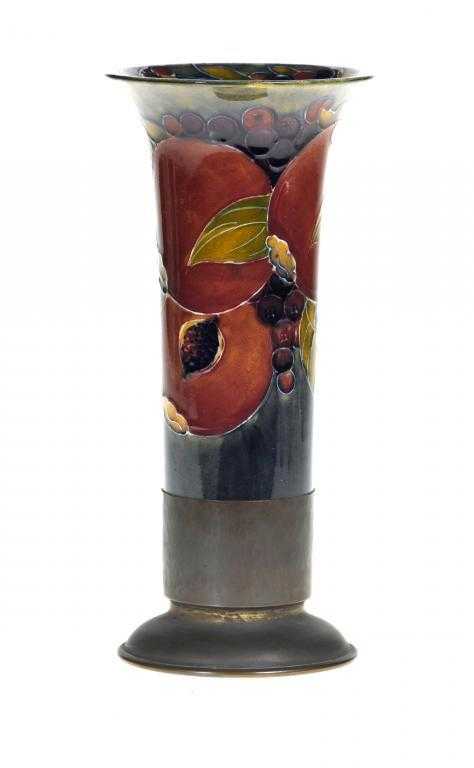 Appraisal: A MOORCROFT EPNS MOUNTED POMEGRANATE VASE DESIGNED BY WILLIAM MOORCROFT