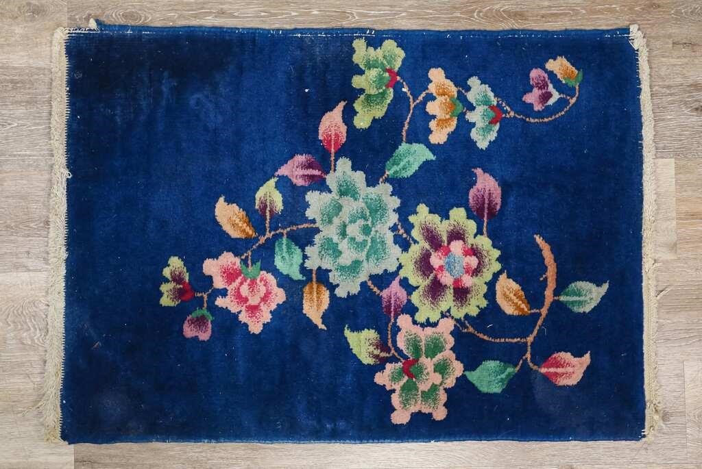 Appraisal: Art Deco floral mat th Century Floral motif against blue