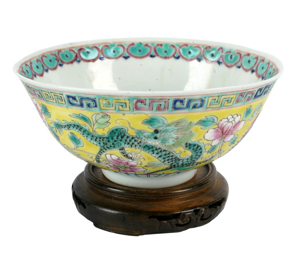 Appraisal: CHINESE PORCELAIN CUPred six-character mark with wooden stand inches diameter