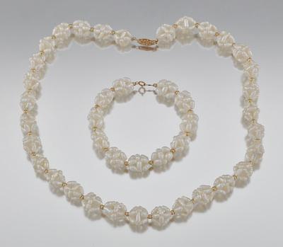 Appraisal: A Popcorn Pearl and Gold Necklace and Bracelet Set Cleverly