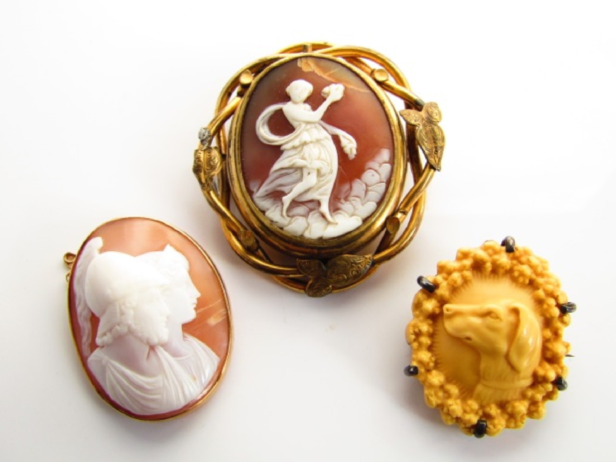 Appraisal: A Victorian style cameo swivel brooch central carved relief of