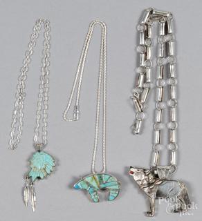 Appraisal: Three Southwestern Native American necklaces to include a silver wolf