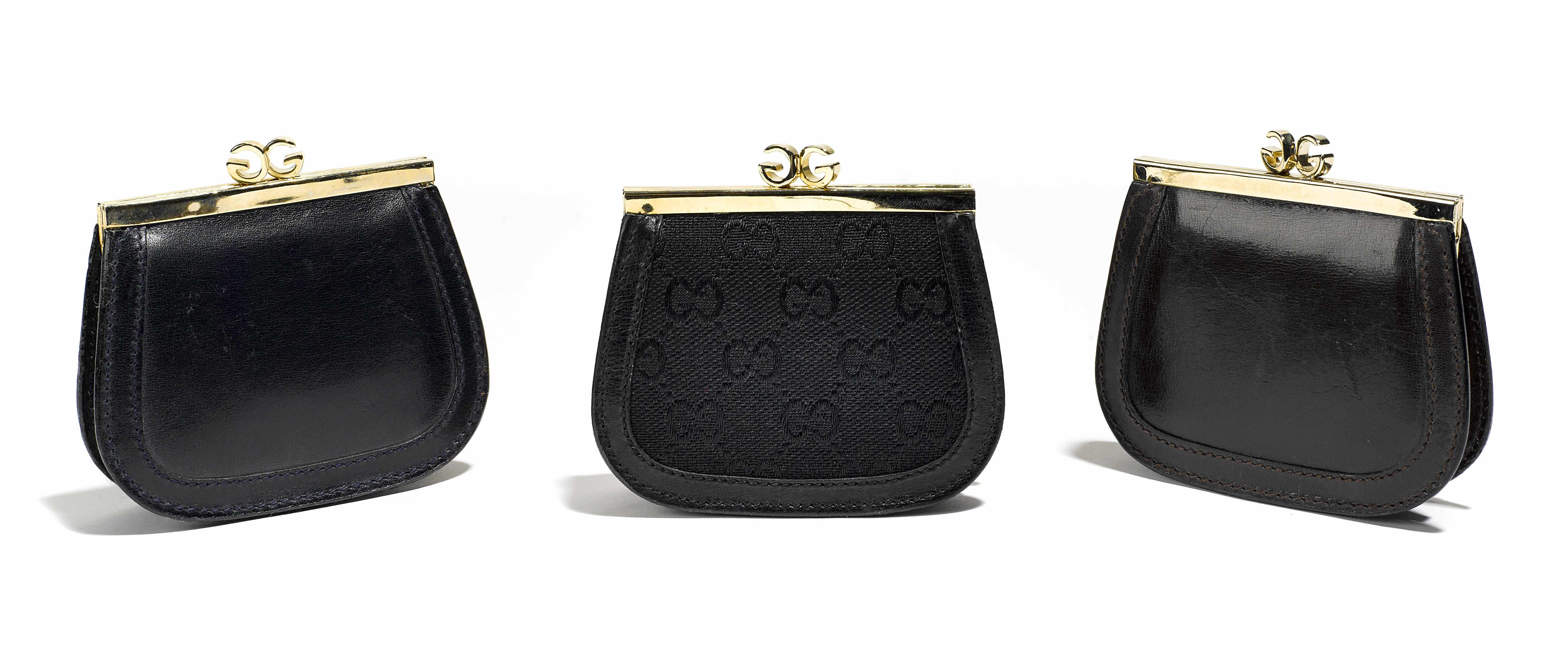 Appraisal: A group of three Gucci change purses one black leather