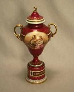 Appraisal: ROYAL VIENNA CAPPED PORCELAIN URN ON DONFORMING PLINTH HAVING WINE