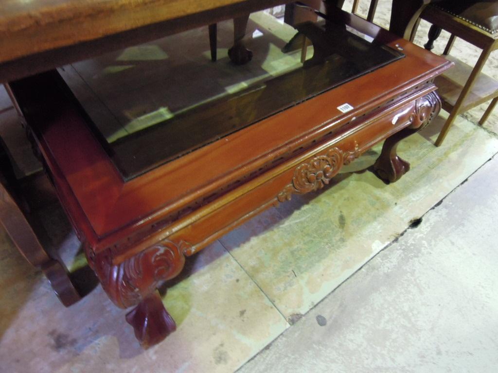 Appraisal: A large low hardwood centre occasional table of rectangular form