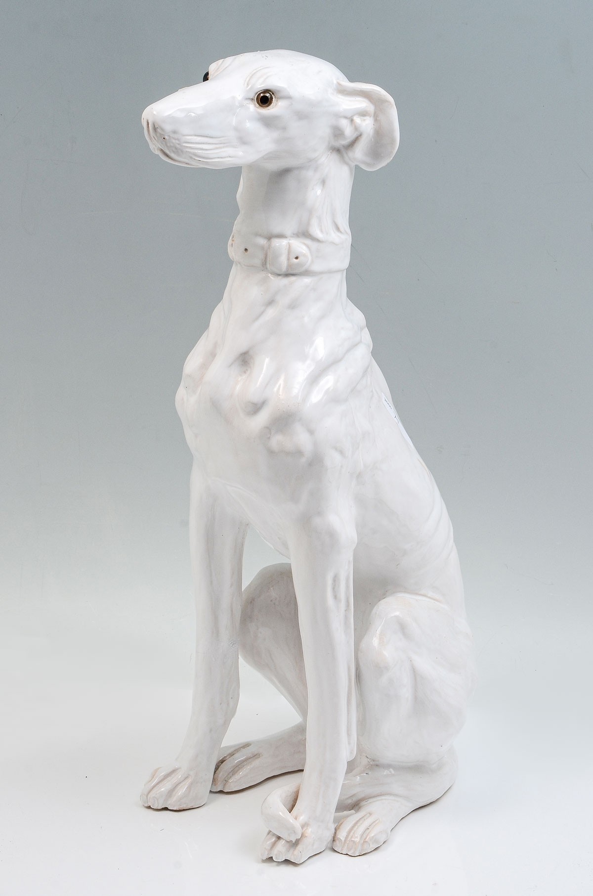 Appraisal: FRENCH PORCELAIN WHIPPET White glazed French pottery Whippet having inset