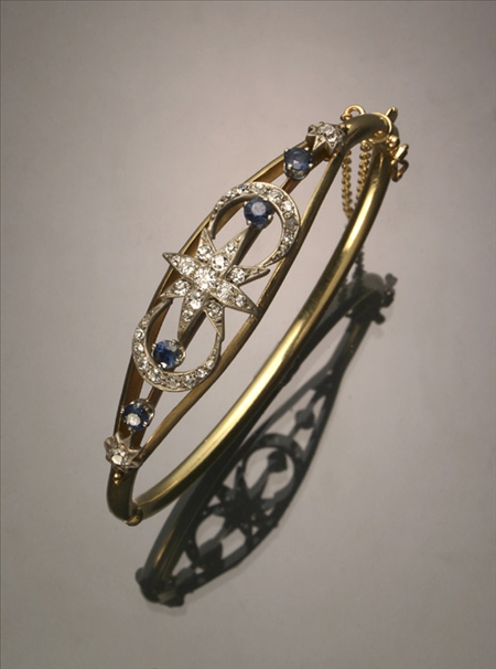 Appraisal: Edwardian Tested -Karat Yellow-Gold Platinum Diamond and Blue Sapphire Bangle