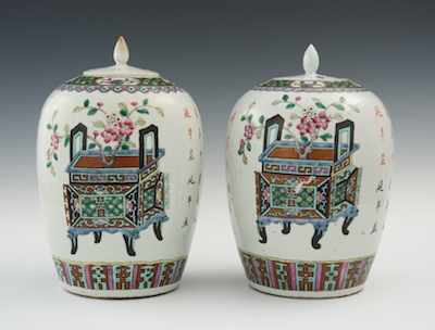 Appraisal: A Pair of Famille Rose Porcelain Temple Jars Chinese The